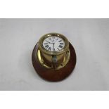 Early 20th century 8 Day car clock by Doxa in circular brass case