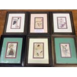 Six framed and glazed postcards including fantasy, glamour, Art Deco, femme au miroir