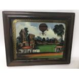 Unusual 19th century reverse painting on glass, featuring a hot air balloon