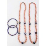 Two Chinese pink hard stone and cloisonné bead necklaces, plus two cloisonné bangles
