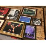 Two boxes of assorted framed colour sports photographs to include Boxing, Formula One, Football and