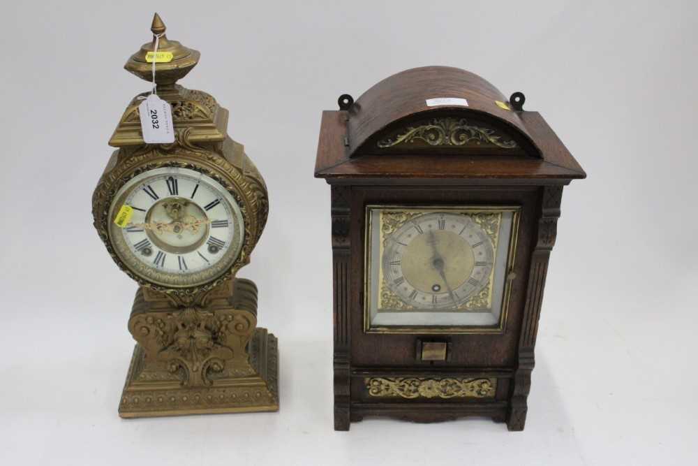 Ornate American mantel clock in gilt case By the Ansonia Clock Co. New York and another oak mantel c