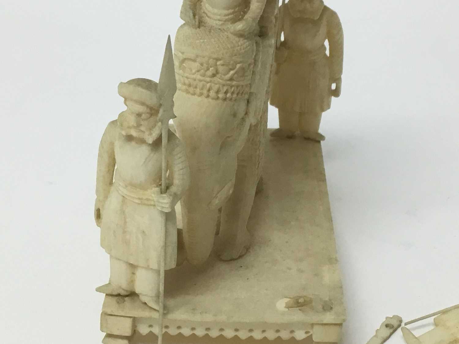 19th century carved Indian elephant and riders group, with attendant figures, on rectangular plinth, - Image 2 of 11