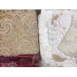 Quantity of embroidered and crocheted table linens, mats etc.
