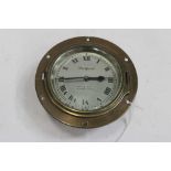 Brass cased ships bulkhead clock with silvered dial marked Watford, by North & Sons Ltd, Watford & L