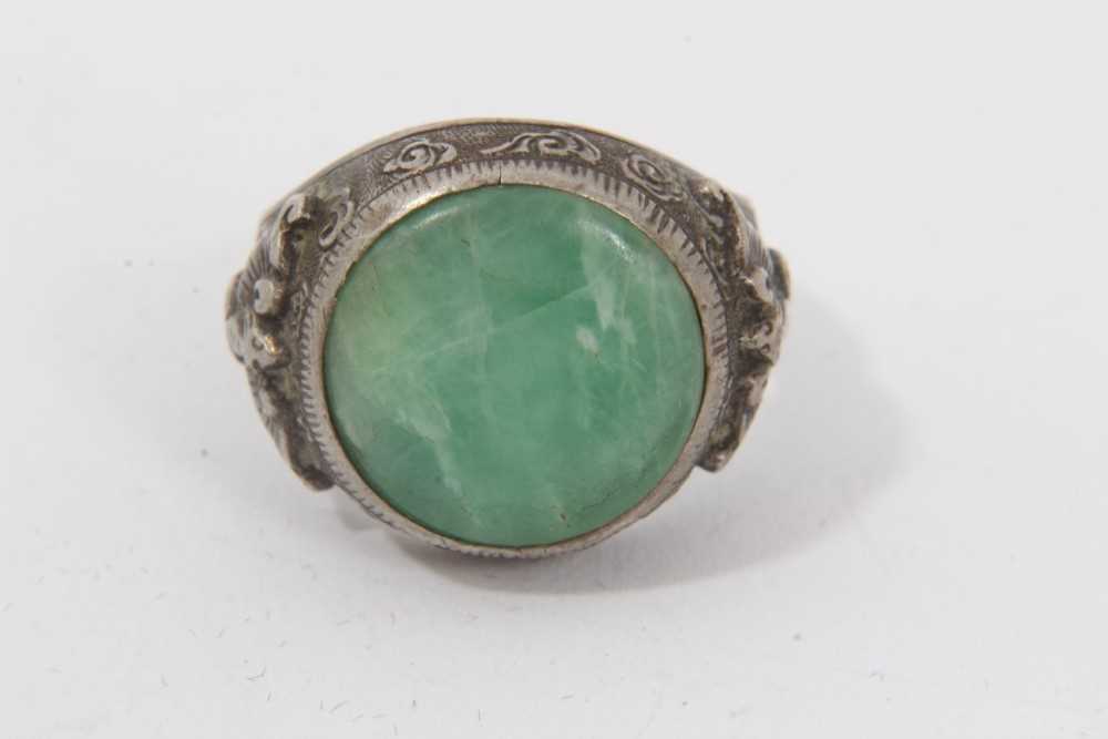 Eleven Chinese green hardstone/jade rings - Image 12 of 18