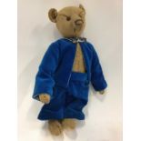 Early Steiff Bear, small size with boot button eyes, thin shaved snout and long tapering limbs.