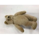 Steiff bear, mid-century. Pale blond mohair plush, button in ear and stitched nose.