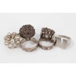 Six silver and white metal rings