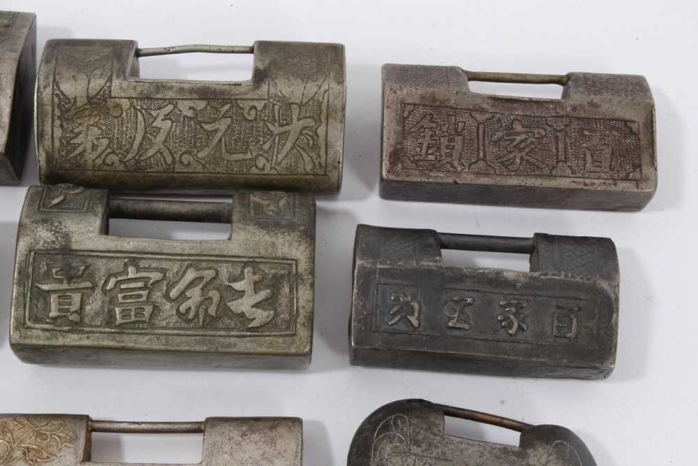 Collection of 15 Chinese silver, white metal and brass padlock style pendants - Image 7 of 9