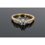 18ct gold diamond single stone ring with diamond set shoulders