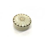 19th Century Ivory and treen snuff box of circular form, 5.2cm in diameter