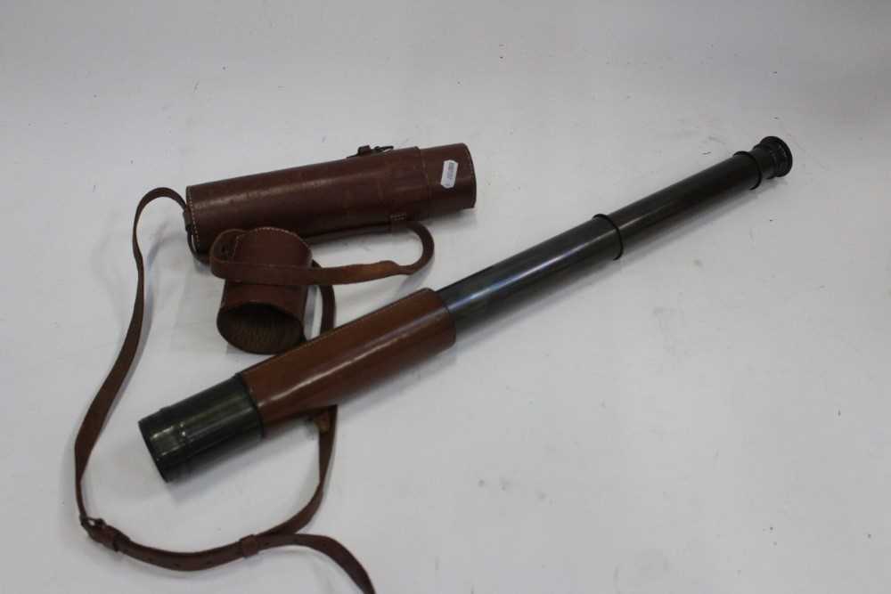 Leather cased three draw brass spotting scope