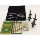 Set of drawing instruments, a set of watch makers screwdrivers, silver darts fob and pair of nut cra