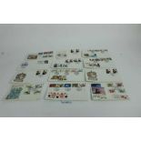 Three folders of GB first day covers