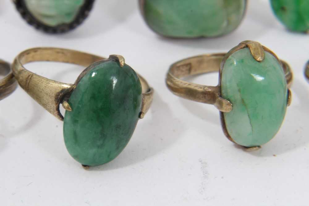 Eleven Chinese green hardstone/jade rings - Image 3 of 18