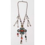 Chinese white metal enamelled open work panel necklace set with three coral cabochons and further co