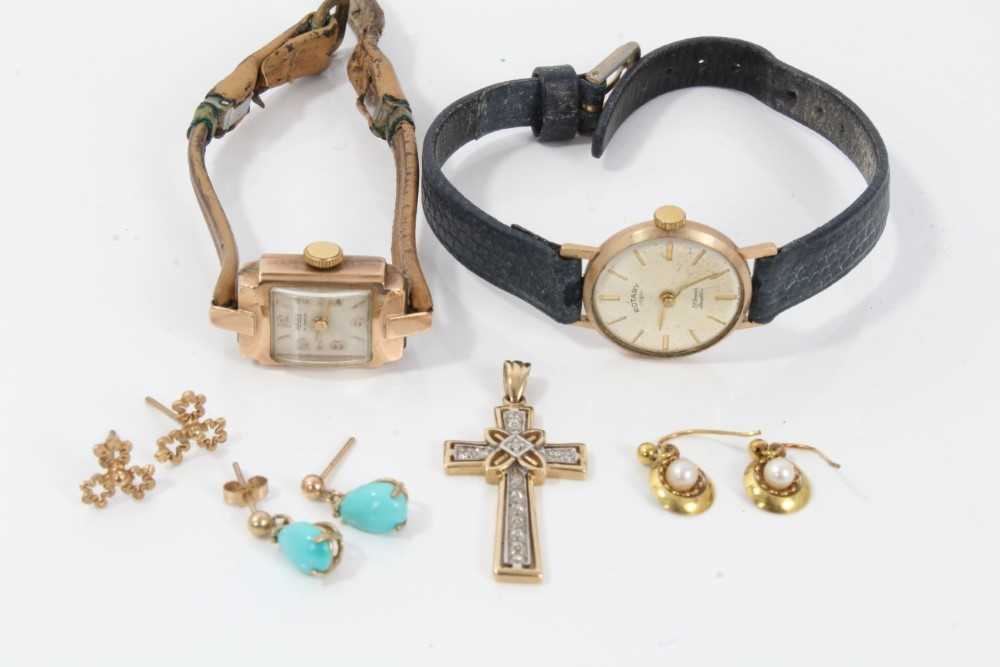 Two 9ct gold cased wristwatches, 9ct gold diamond set cross pendant and three pairs 9ct gold earring