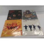 Seven Beatles LPs in new condition reissues