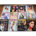 Large quantity of 1980's and 90's Playboy Magazines in seven boxes.