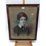 Victorian English School pastel and charcoal - portrait of a young boy in black coat and bow tie, in