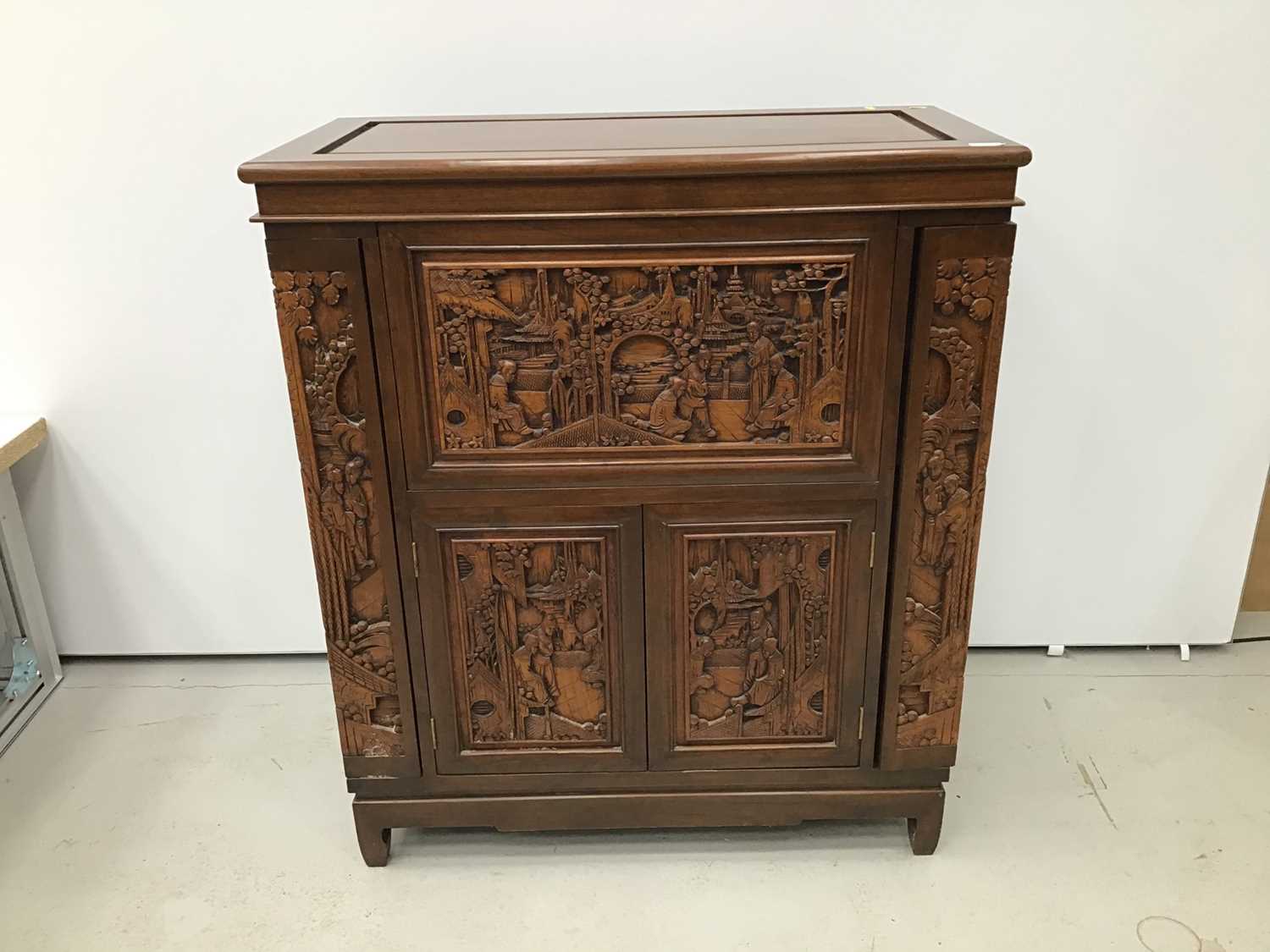 Chinese carved wooden cocktail cabinet