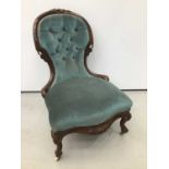 Mid Victorian carved walnut upholstered spoon back chair