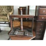 Antique oak and fruitwood book press with turned wooden thread, approximately 86cm high