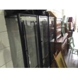 Three black metal framed glass display cabinets with glass shelves, 45 x 180.5 x 40cm