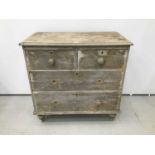 Antique pine chest of two short over two long drawers on bun feet, 89cm wide x 48cm deep x 88cm high