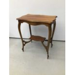 Shaped top two tier table together with set of hardwood steps