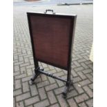 Mahogany framed fire screen together with another glass panelled screen