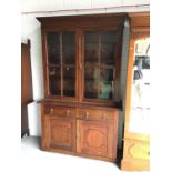 Good quality Edwardian mahogany two-height bookcase with moulded dentil cornice, the interior with w