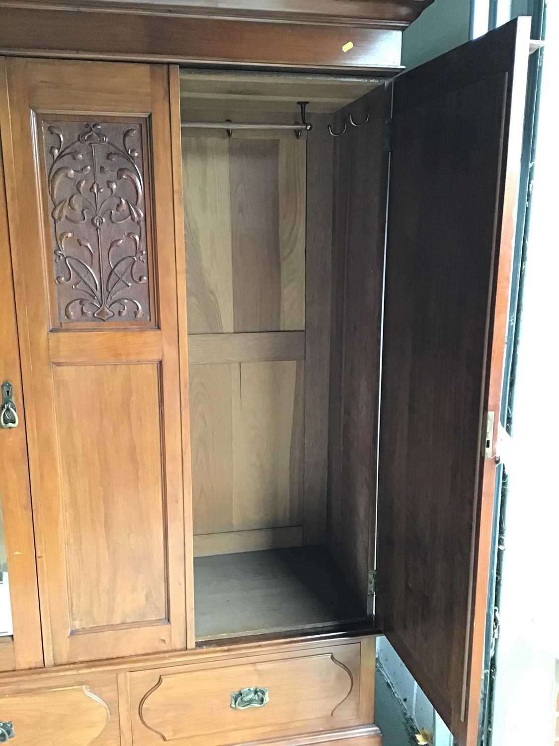 Art Nouveau mahogany wardrobe, with moulded cornice and twin mirrored doors between relief carved fo - Image 2 of 5