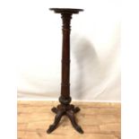 Large mahogany torchere