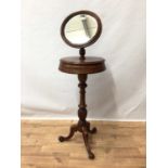 19th century mahogany shaving stand with adjustable angle-poise circular mirror on revolving platfor