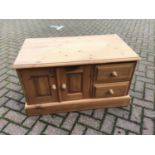 Pine low cupboard with two doors and two drawers, 91cm wide x 51cm high x 50cm deep