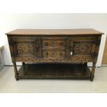 Good quality 1920s Jacobean revival carved honey oak sideboard