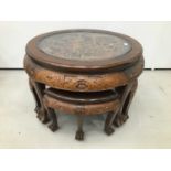 Chinese circular carved coffee table with integral nest of tables