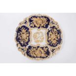 Meissen gilt-highlighted cobalt blue dish, decorated with flowers in relief, crossed swords mark to