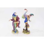 Pair of German Volkstedt porcelain figures of jesters