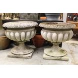 Pair of massive concrete garden urns