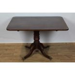 Georgian mahogany pedestal breakfast table with rounded rectangular top