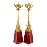 Pair of impressive 19th century ormolu candelabra, on later bespoke painted wooden shaped stands