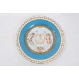 Sevres porcelain cabinet plate with handpainted putti pattern within a bleu ciel border with gilt