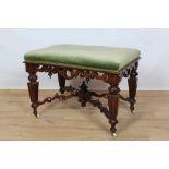 Good quality Victorian walnut framed stool with green velvet upholstered top, carved decoration and