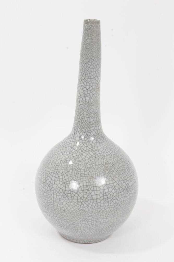 Chinese crackle-glazed bottle vase, of slender form, the glaze a greyish celadon colour, 25cm height