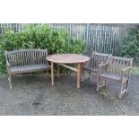 Circular teak garden table, together with set of three garden armchairs, another pair and three gard