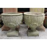 Pair of concrete garden urns