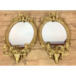 Pair of mid Victorian giltwood and gesso girandoles with fern ornament